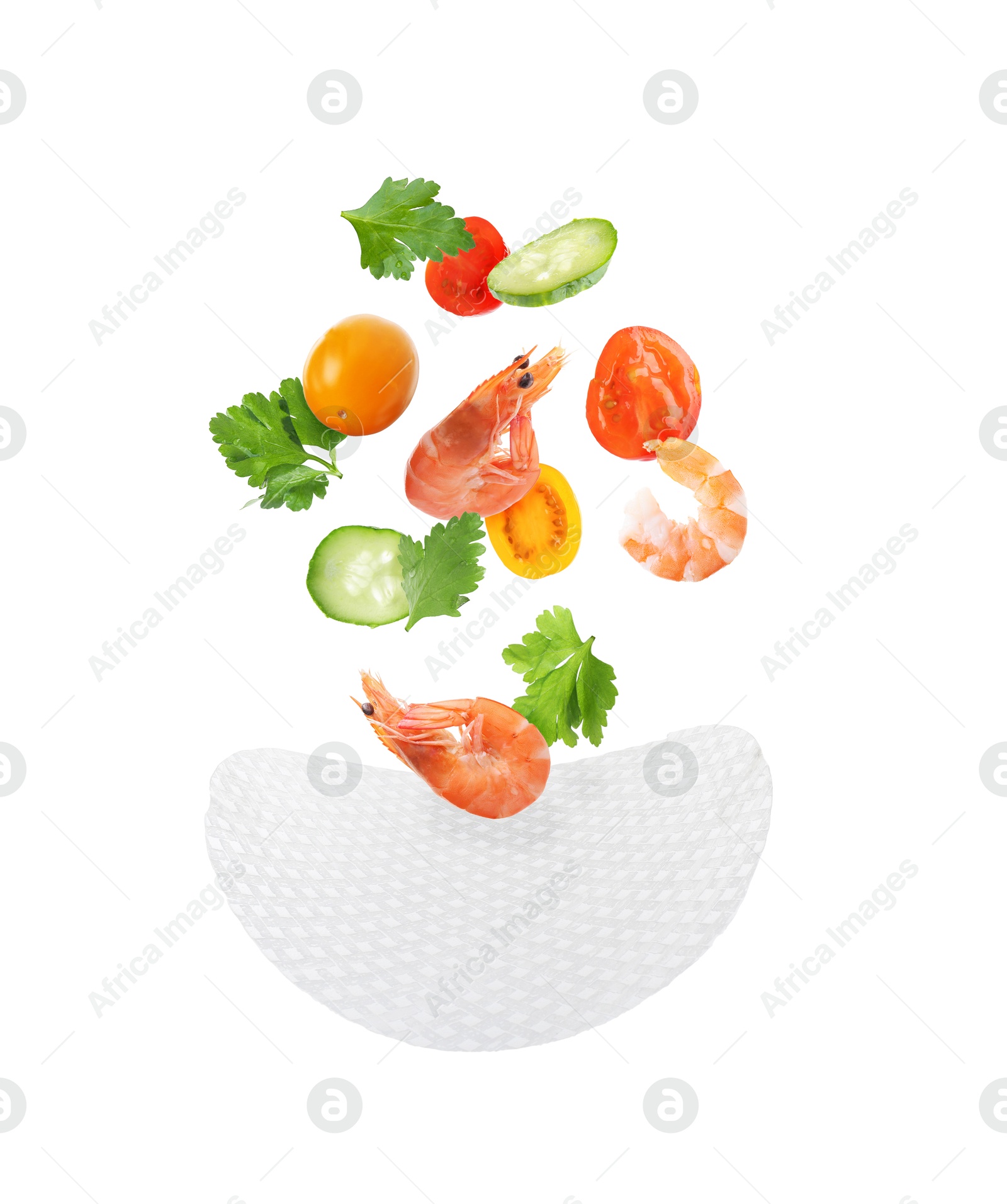 Rice paper and different ingredients falling on white background Image of Rice paper and different ingredients falling on white background