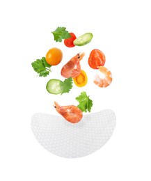 Image of Rice paper and different ingredients falling on white background