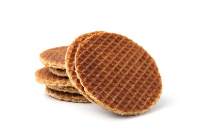 Photo of Tasty round Dutch waffles isolated on white