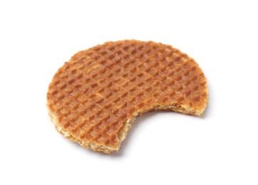 Photo of Bitten round Dutch waffle isolated on white