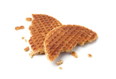 Photo of Pieces of tasty round waffle isolated on white