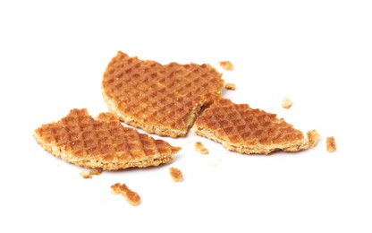 Photo of Pieces of tasty waffle isolated on white