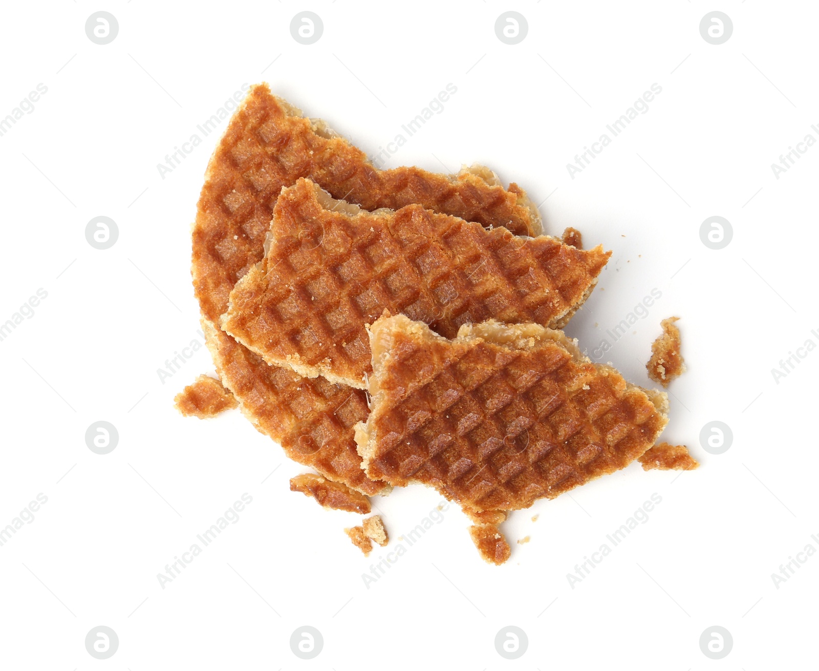 Pieces of tasty waffle isolated on white, top view Photo of Pieces of tasty waffle isolated on white, top view