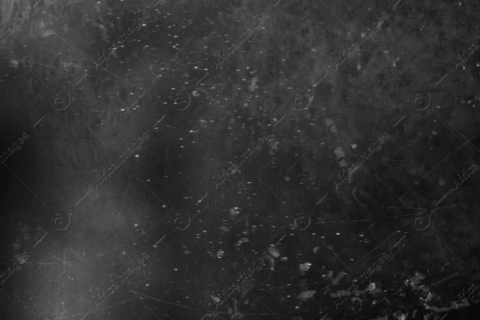 Dust on black textured surface, top view Image of Dust on black textured surface, top view