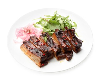 Photo of Delicious pork ribs, arugula and onion isolated on white