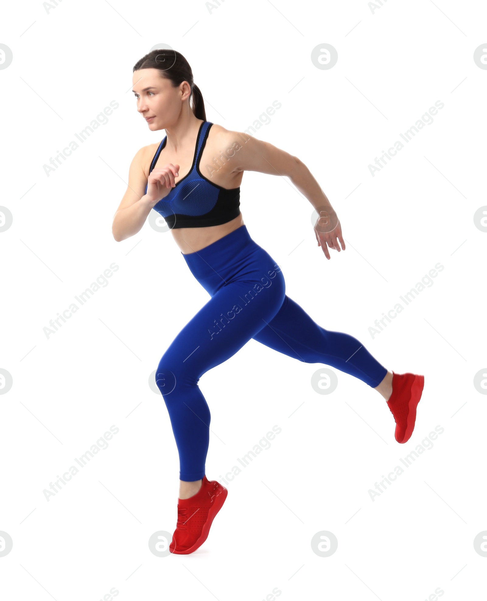 Woman in sportswear exercising on white background Photo of Woman in sportswear exercising on white background