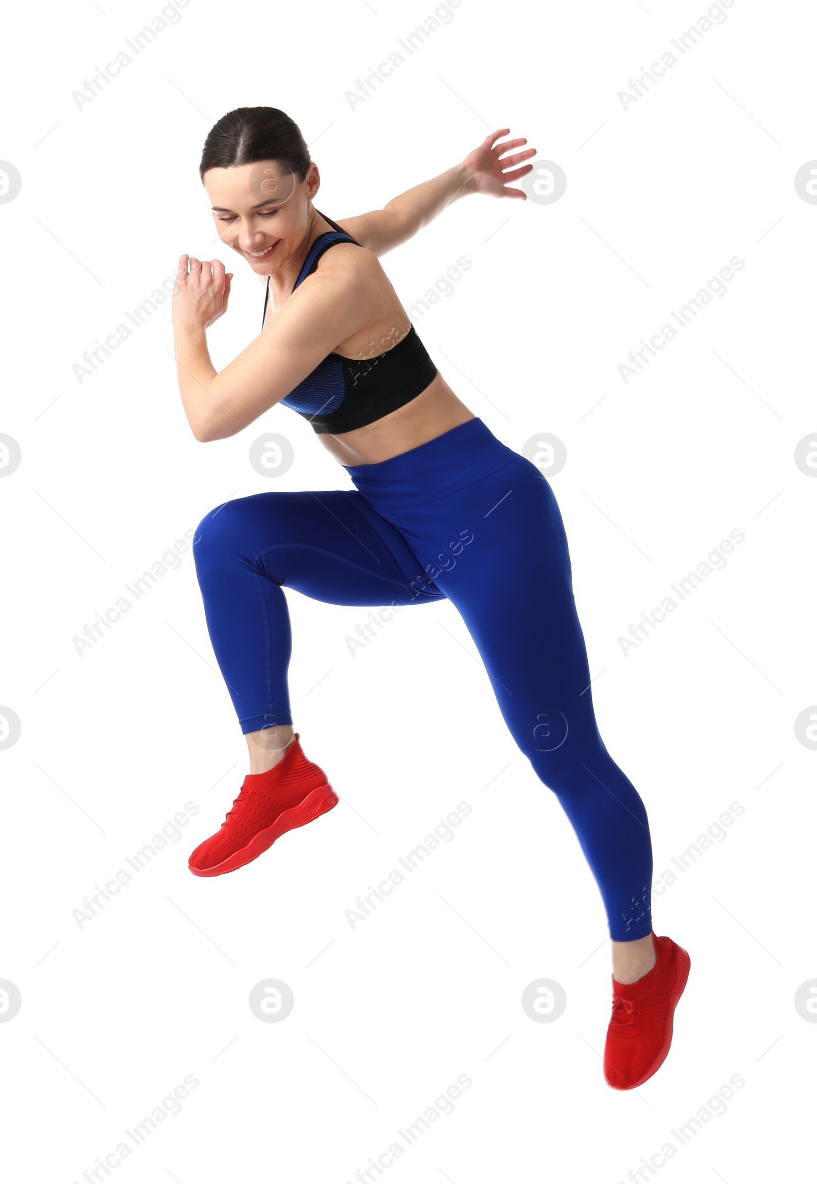 Woman in sportswear exercising on white background Photo of Woman in sportswear exercising on white background