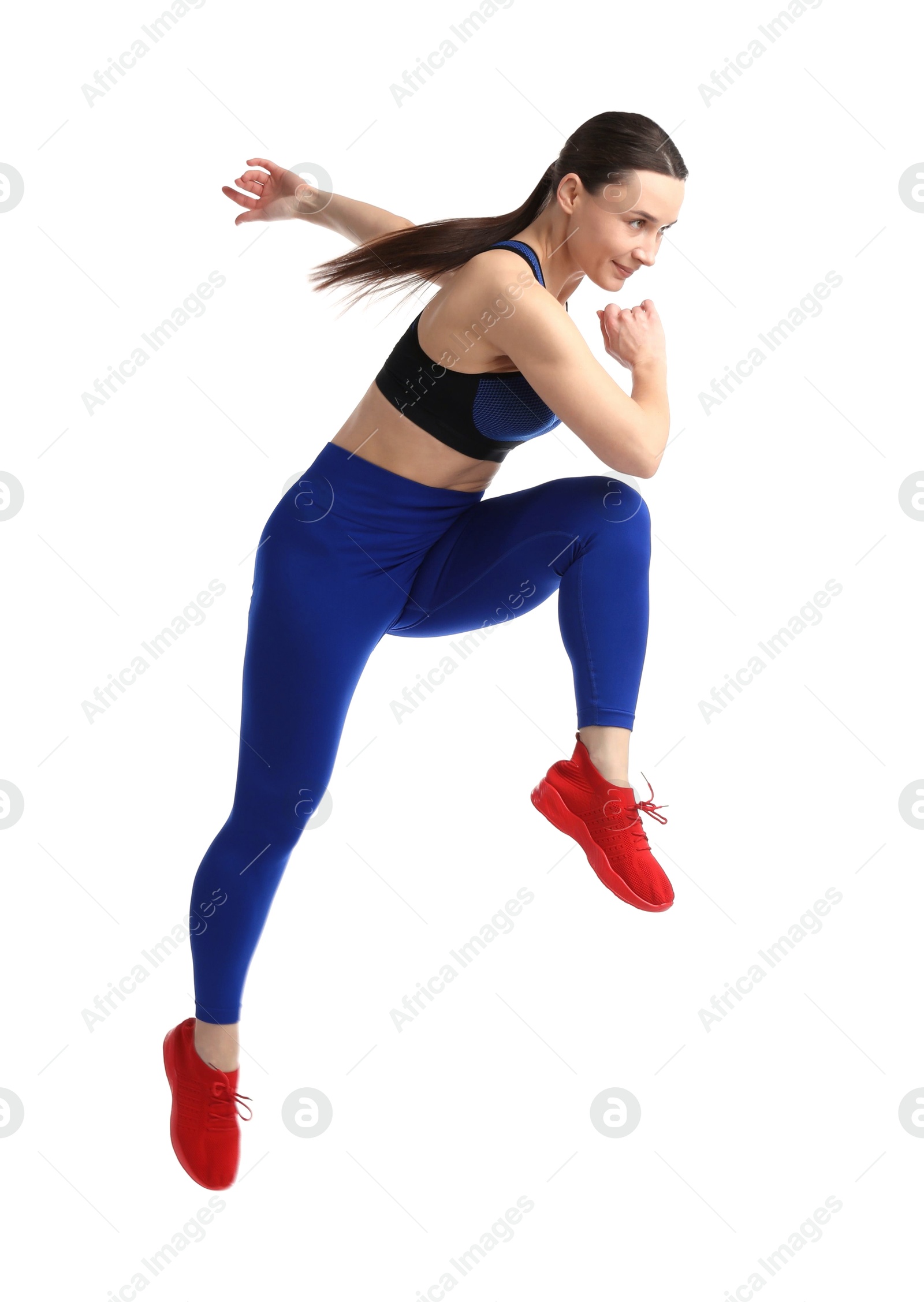 Woman in sportswear exercising on white background Photo of Woman in sportswear exercising on white background