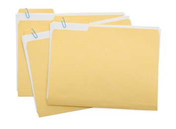 Photo of Three file folders with papers isolated on white, top view