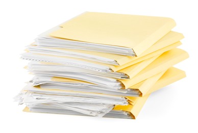 Photo of Stack of file folders with papers isolated on white