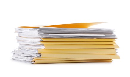 Photo of Stack of file folders with papers isolated on white