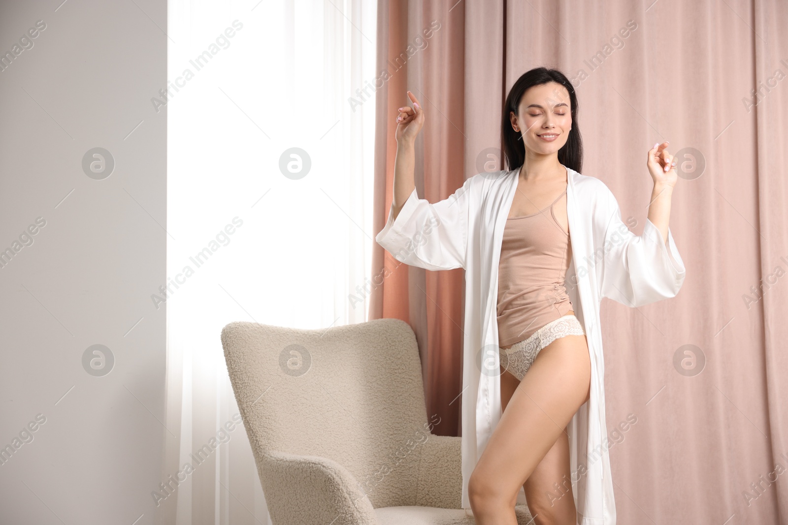 Woman in beautiful underwear indoors. Space for text Photo of Woman in beautiful underwear indoors. Space for text