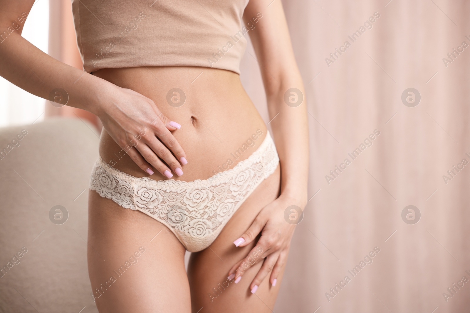 Woman in beautiful lace underwear indoors, closeup Photo of Woman in beautiful lace underwear indoors, closeup