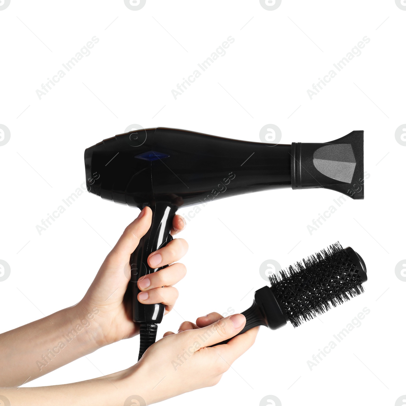 Woman with hair dryer and round brush on white background, closeup Photo of Woman with hair dryer and round brush on white background, closeup