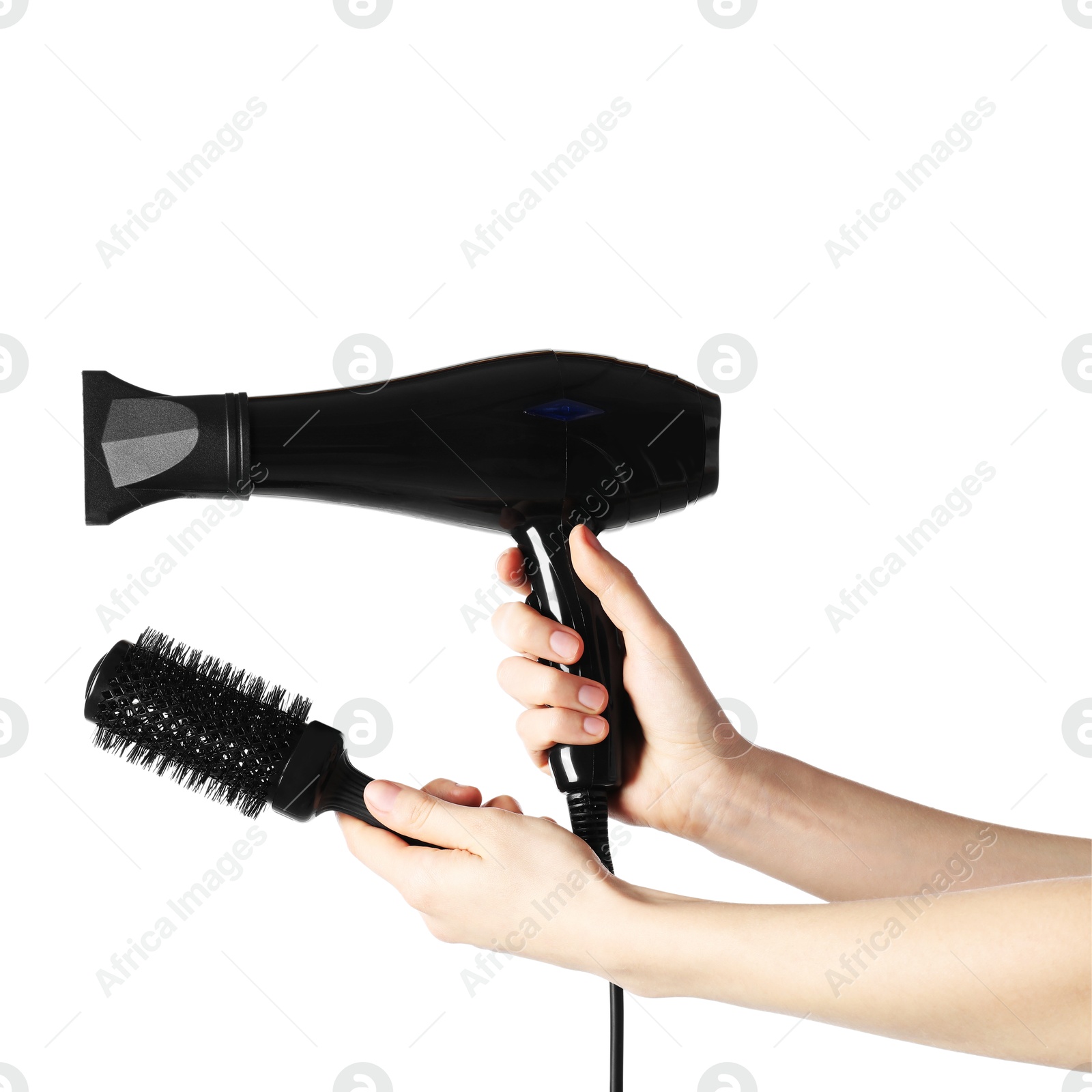 Woman with hair dryer and round brush on white background, closeup Photo of Woman with hair dryer and round brush on white background, closeup