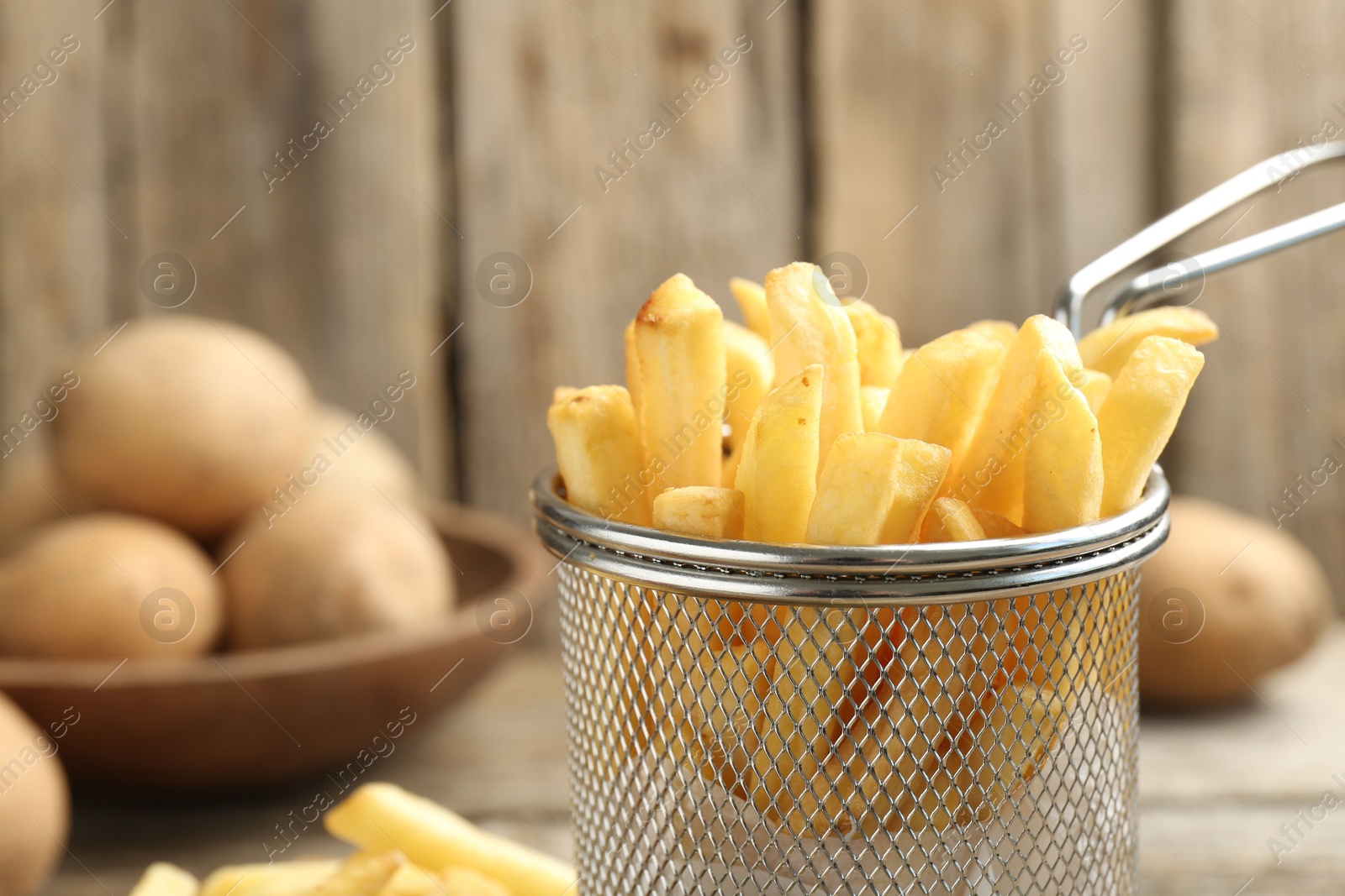 Tasty french fries served on table, closeup Photo of Tasty french fries served on table, closeup