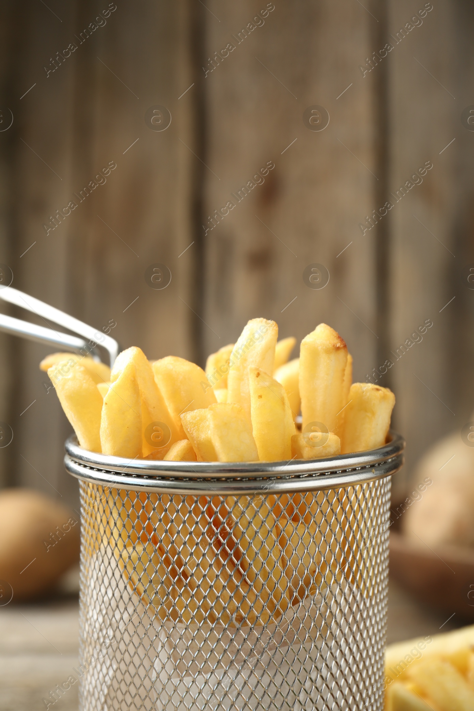 Tasty french fries served on table, closeup Photo of Tasty french fries served on table, closeup