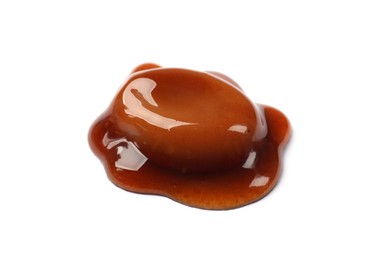 Photo of Tasty sweet candy and caramel sauce isolated on white