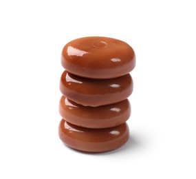 Photo of Tasty sweet caramel candies isolated on white