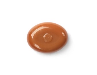 Photo of One tasty sweet caramel candy isolated on white, top view