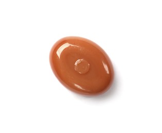 Photo of One tasty sweet caramel candy isolated on white, top view