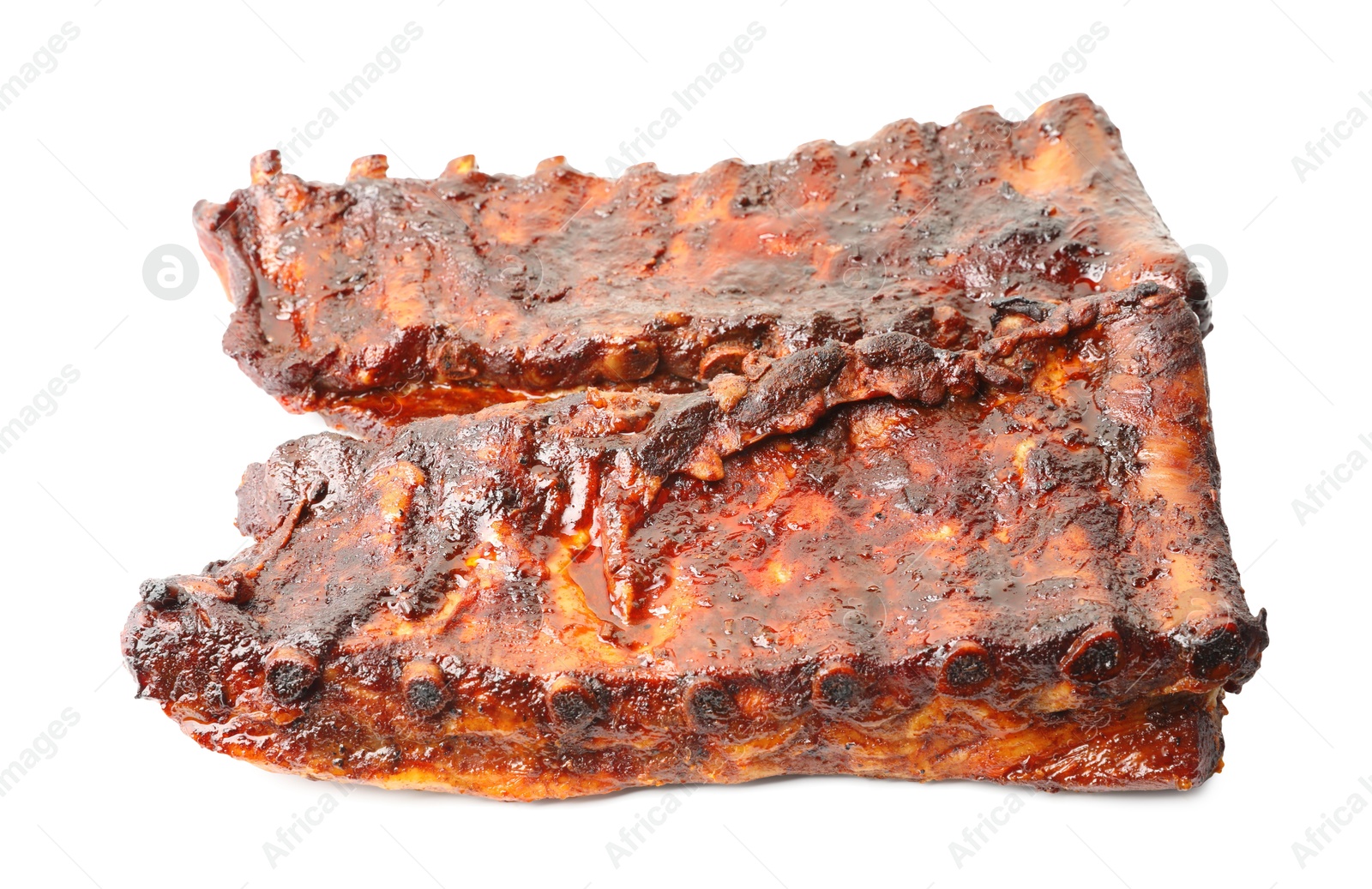 Tasty roasted pork ribs isolated on white Photo of Tasty roasted pork ribs isolated on white