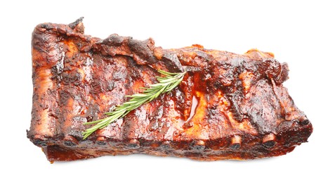 Photo of Tasty roasted pork ribs and rosemary isolated on white, top view