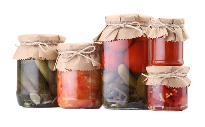 Photo of Many jars with different pickled products isolated on white
