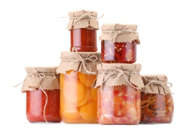 Photo of Many jars with different pickled products isolated on white