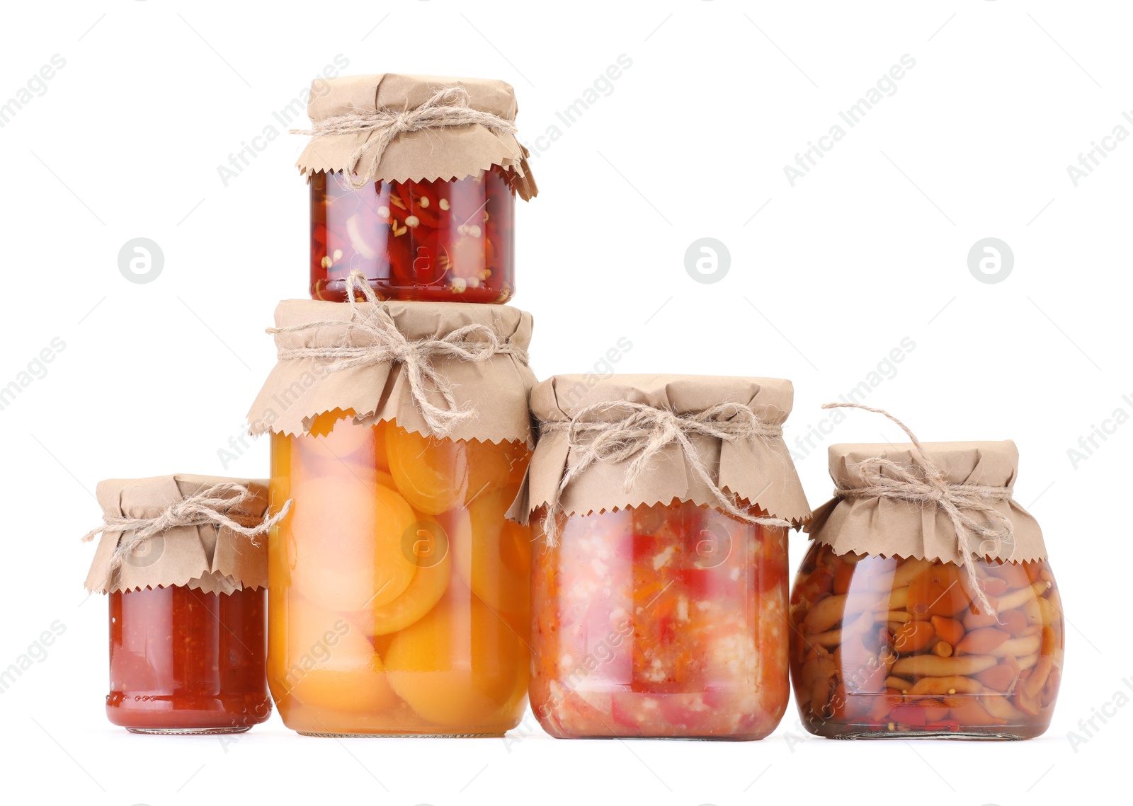 Many jars with different pickled products isolated on white Photo of Many jars with different pickled products isolated on white