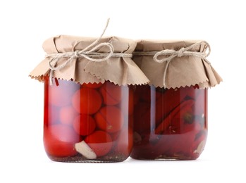 Photo of Jars with different pickled products isolated on white