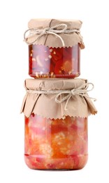 Photo of Jars with different pickled products isolated on white