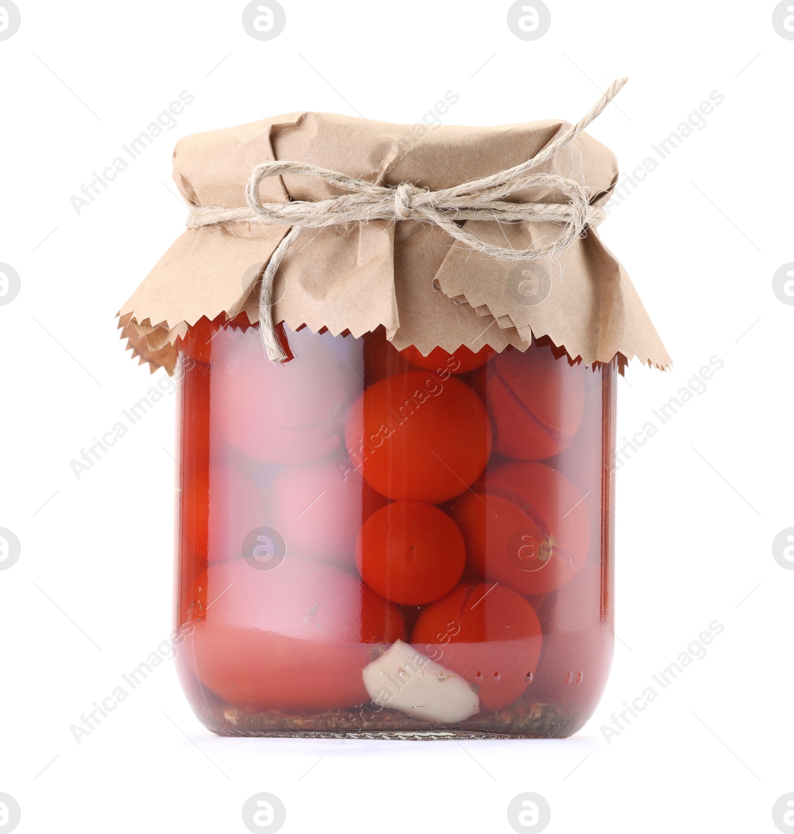 Tasty pickled tomatoes in jar isolated on white Photo of Tasty pickled tomatoes in jar isolated on white