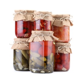 Photo of Many jars with different pickled products isolated on white