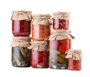 Photo of Many jars with different pickled products isolated on white