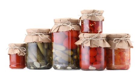 Photo of Many jars with different pickled products isolated on white