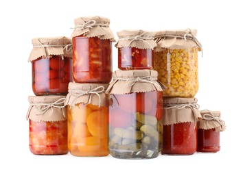 Photo of Many jars with different pickled products isolated on white