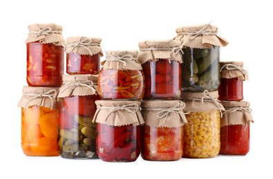 Photo of Many jars with different pickled products isolated on white