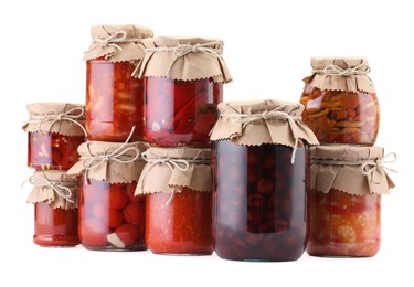 Photo of Many jars with different pickled products isolated on white