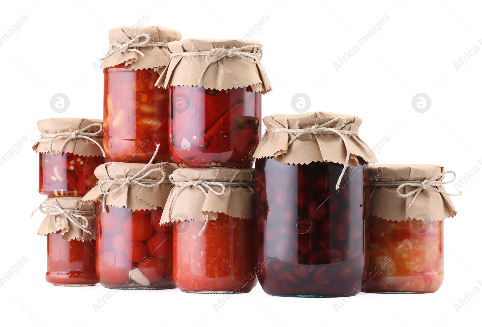 Many jars with different pickled products isolated on white Photo of Many jars with different pickled products isolated on white