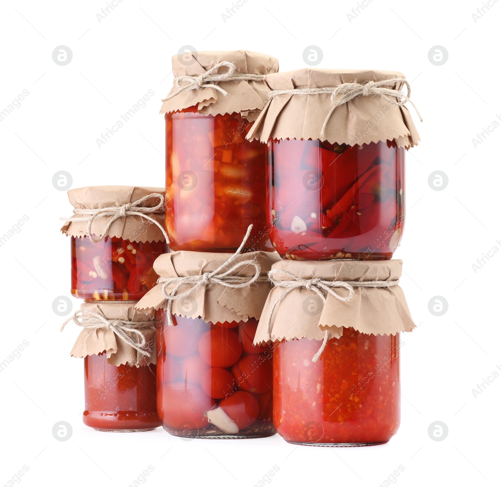 Many jars with different pickled products isolated on white Photo of Many jars with different pickled products isolated on white