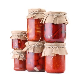 Photo of Many jars with different pickled products isolated on white