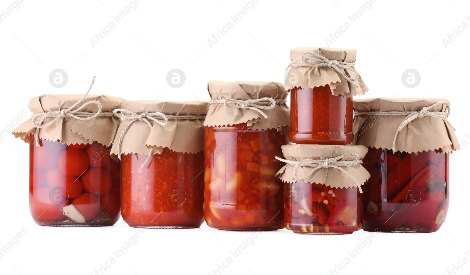 Many jars with different pickled products isolated on white Photo of Many jars with different pickled products isolated on white