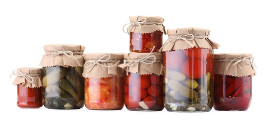 Photo of Many jars with different pickled products isolated on white