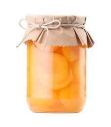 Photo of Tasty canned apricots in jar isolated on white