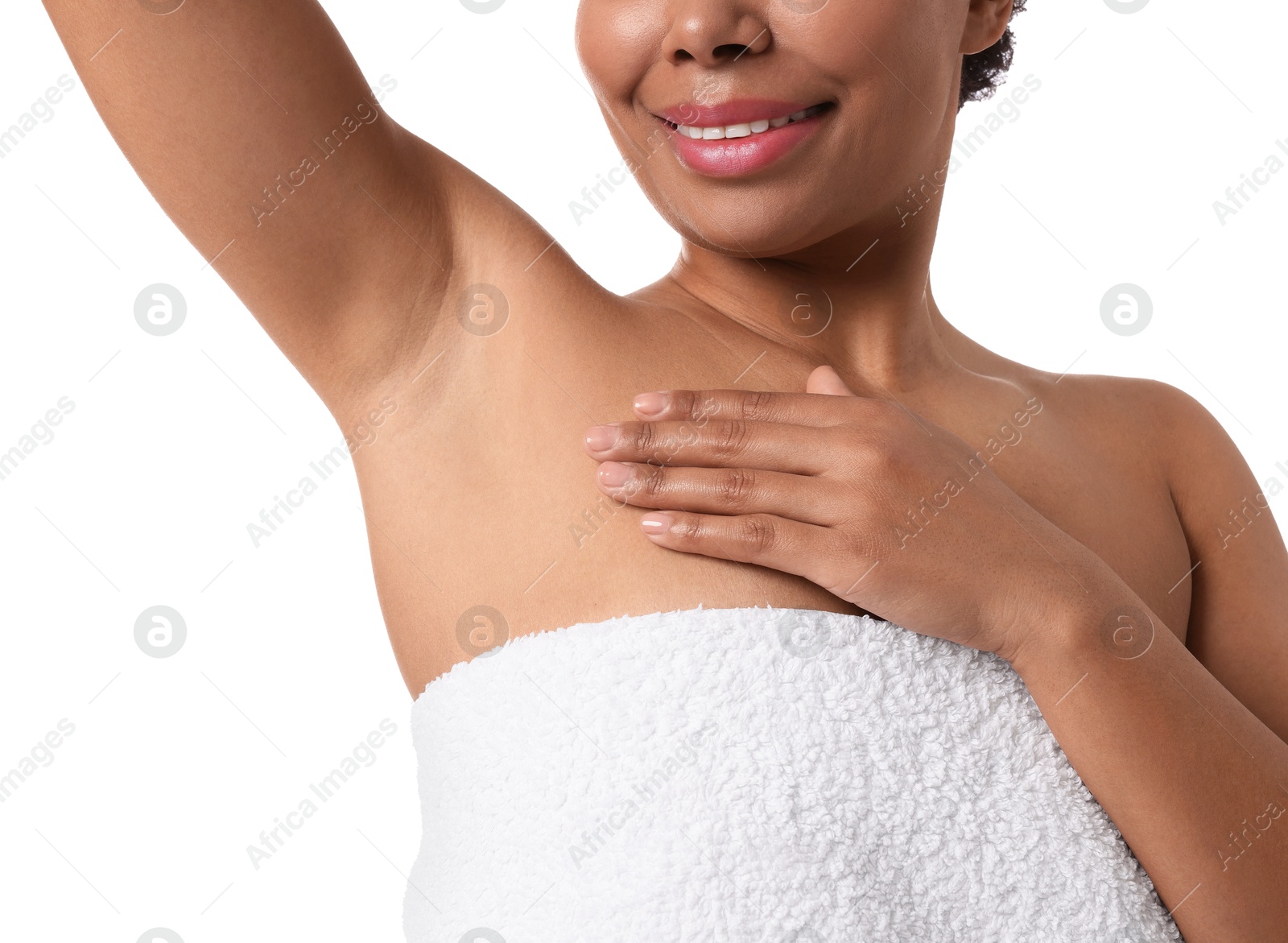 Photo of Woman showing hairless armpit after epilation procedure on white background, closeup