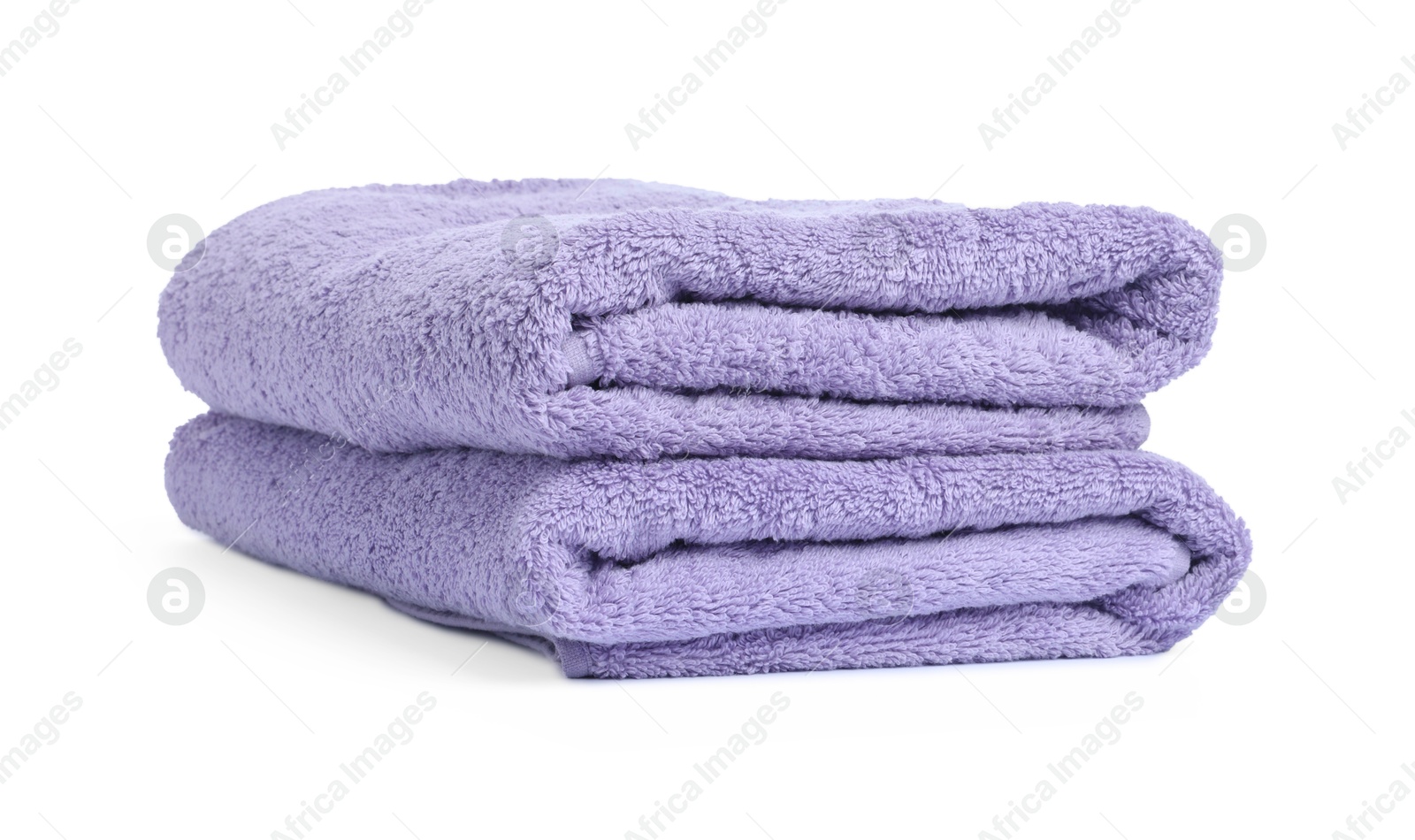 Stack of clean towels isolated on white Photo of Stack of clean towels isolated on white
