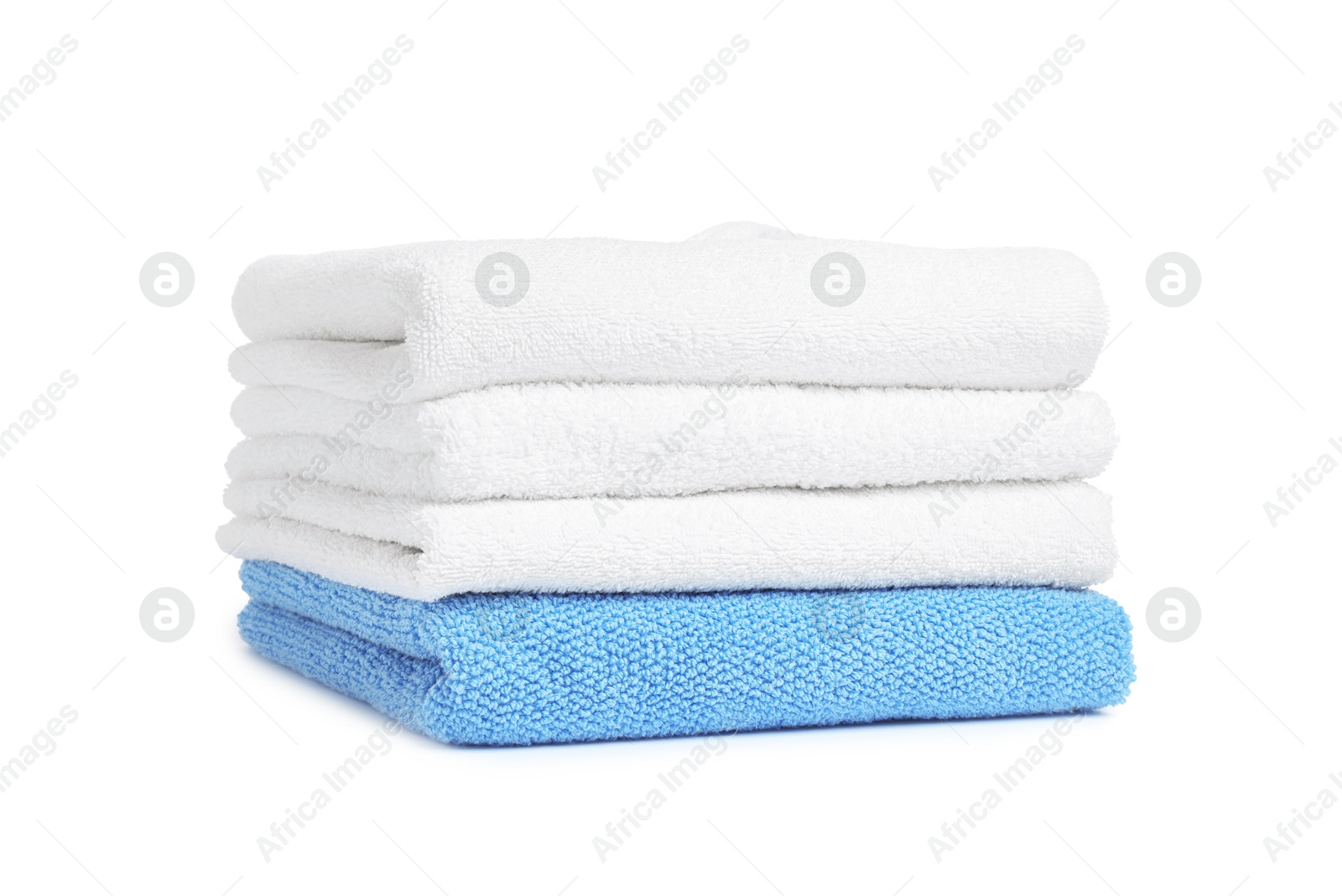 Stack of clean towels isolated on white Photo of Stack of clean towels isolated on white