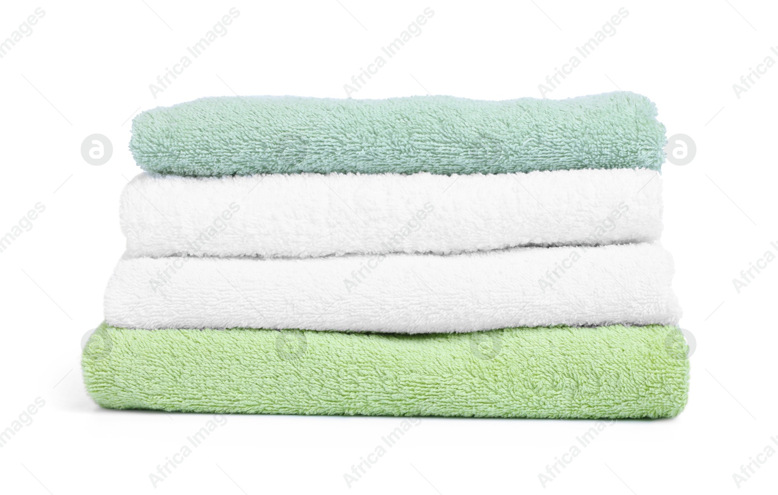 Stack of clean towels isolated on white Photo of Stack of clean towels isolated on white