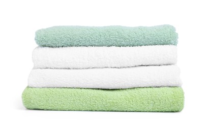 Photo of Stack of clean towels isolated on white